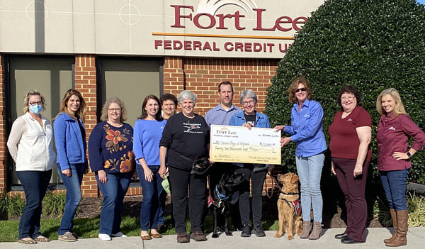 Fort Lee Federal Credit Union was proud to donate $22,000 to Service Dogs of Virginia. Total funds raised were the combined result of three charitable initiatives.  Fort Lee Federal Credit Union’s Annual Charity Golf Tournament proceeds totaled $18,000. The event was hosted in September at the Cardinal Golf Course on Fort Lee. A very special thanks goes to our event sponsors: CUNA Mutual, Premier Sponsor; Fiserv, Registration and Range Sponsor; Eddie Whitlock of Lafayette, Ayers and Whitlock, Dinner Sponsor; Allied Solutions, Contest Sponsor; Beverage Sponsors; Cart and Hole Sponsors; and all participants and volunteers.