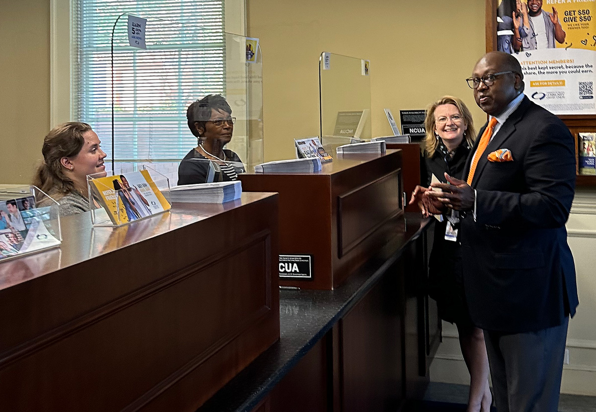 NCUA Board Member Rodney Hood visits a branch office of UVA Community Credit Union.