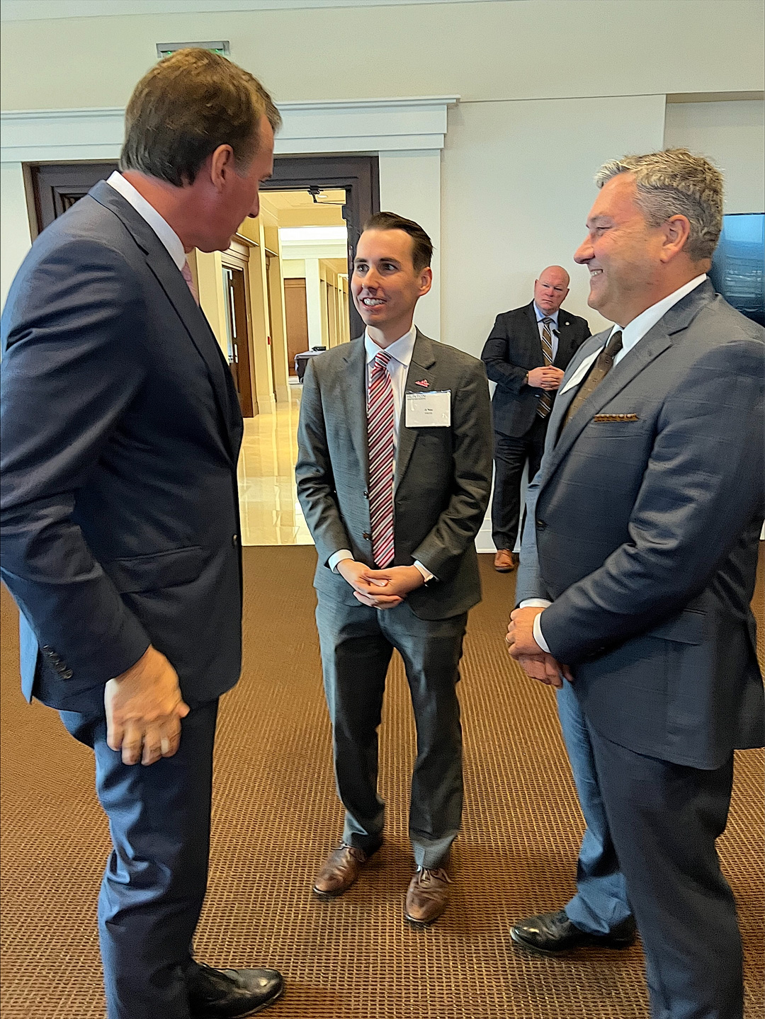Northwest Federal Credit Union CEO and League Vice Chairman Jeff Bentley (pictured right) and League Chief Advocacy Officer JT Blau (center) met today with Gov. Glenn Youngkin at a breakfast event hosted by the Hunton Andrews Kurth, our lobbying firm.