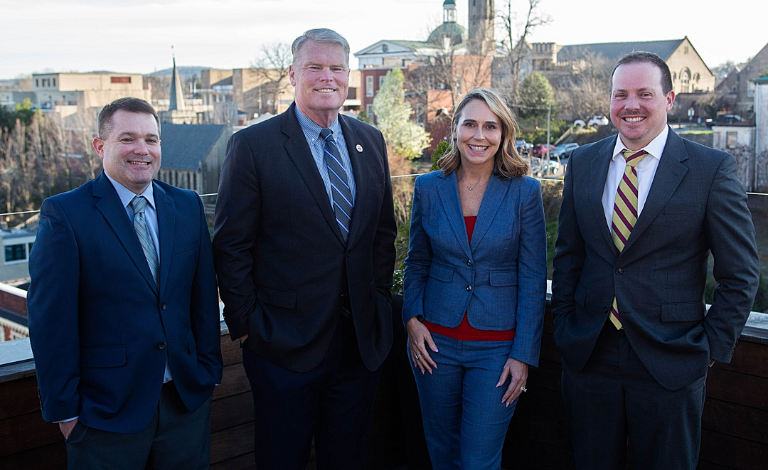 Ryan Bell (Branch Manager), Bradley Butler (VP Private Banking), Courtney Woody (VP Mortgage Loan Originator), and Brent Jenkins (Market Executive – Lynchburg). 