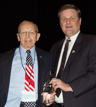 Retired ABNB President/CEO and current Board member Bob Morgan (pictured left) has been awarded the Virginia Credit Union League's 2013 James P. Kirsch Lifetime Achievement Award. Presenting the award is League President Rick Pillow.
