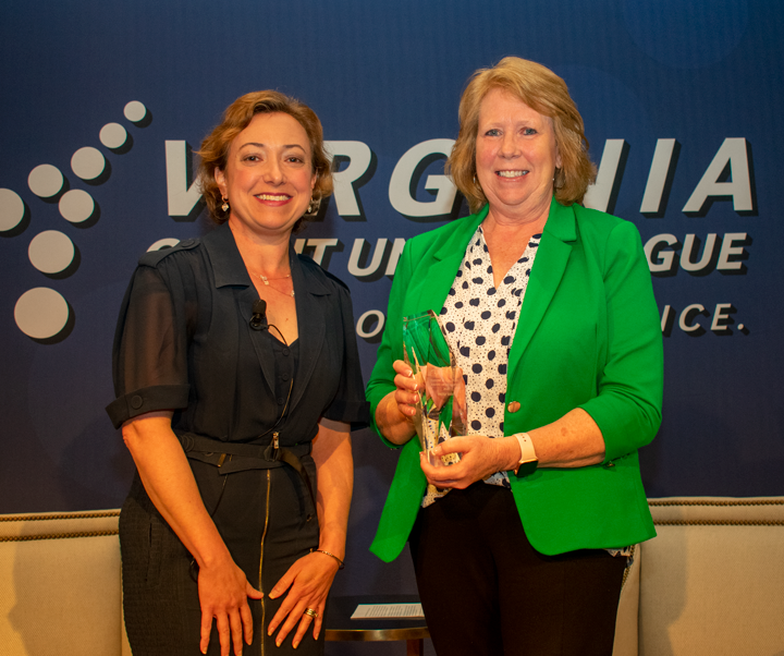 Patsy Smith (pictured right), recently retired CEO of Petersburg-based Peoples Advantage Federal Credit Union, has been recognized by the Commonwealth's credit unions with the Eugene H. Farley Jr. Award of Excellence. Presenting the award is Virginia Credit Union League President/CEO Carrie Hunt.