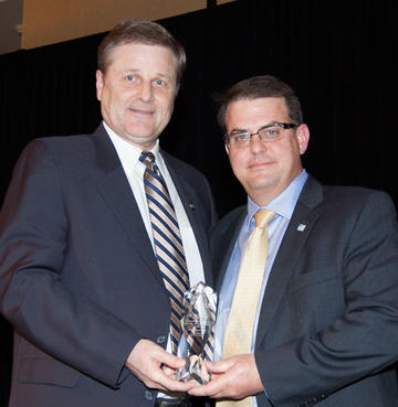Paul Phillips (pictured right), president/CEO of Roanoke-based Freedom First Credit Union has been awarded one of the Virginia credit union system's highest individual honors – the Eugene H. Farley Jr. Award of Excellence. The award is given annually to a credit union professional or volunteer official in recognition of his or her outstanding contributions to an individual credit union or to the credit union movement. Presenting the award is Virginia Credit Union League President Rick Pillow.
