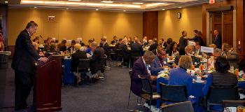 League President Rick Pillow addresses the 100 credit union supporters at the League Congressional Luncheon.