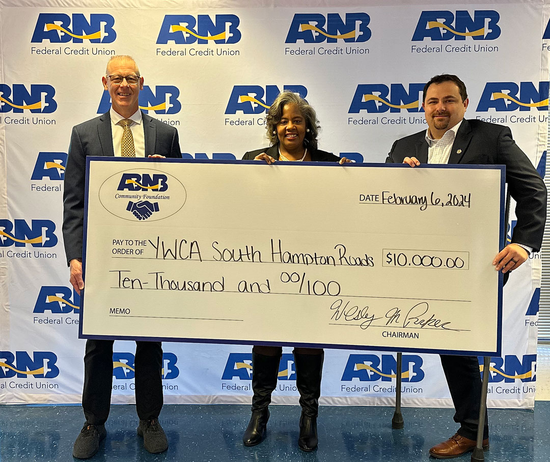 ABNB Federal Credit Union Executive Vice President, Tony Caccese; YWCA Chief Executive Officer, Michelle Ellis Young; and ABNB Community Foundation Chairman Wesley Parker.