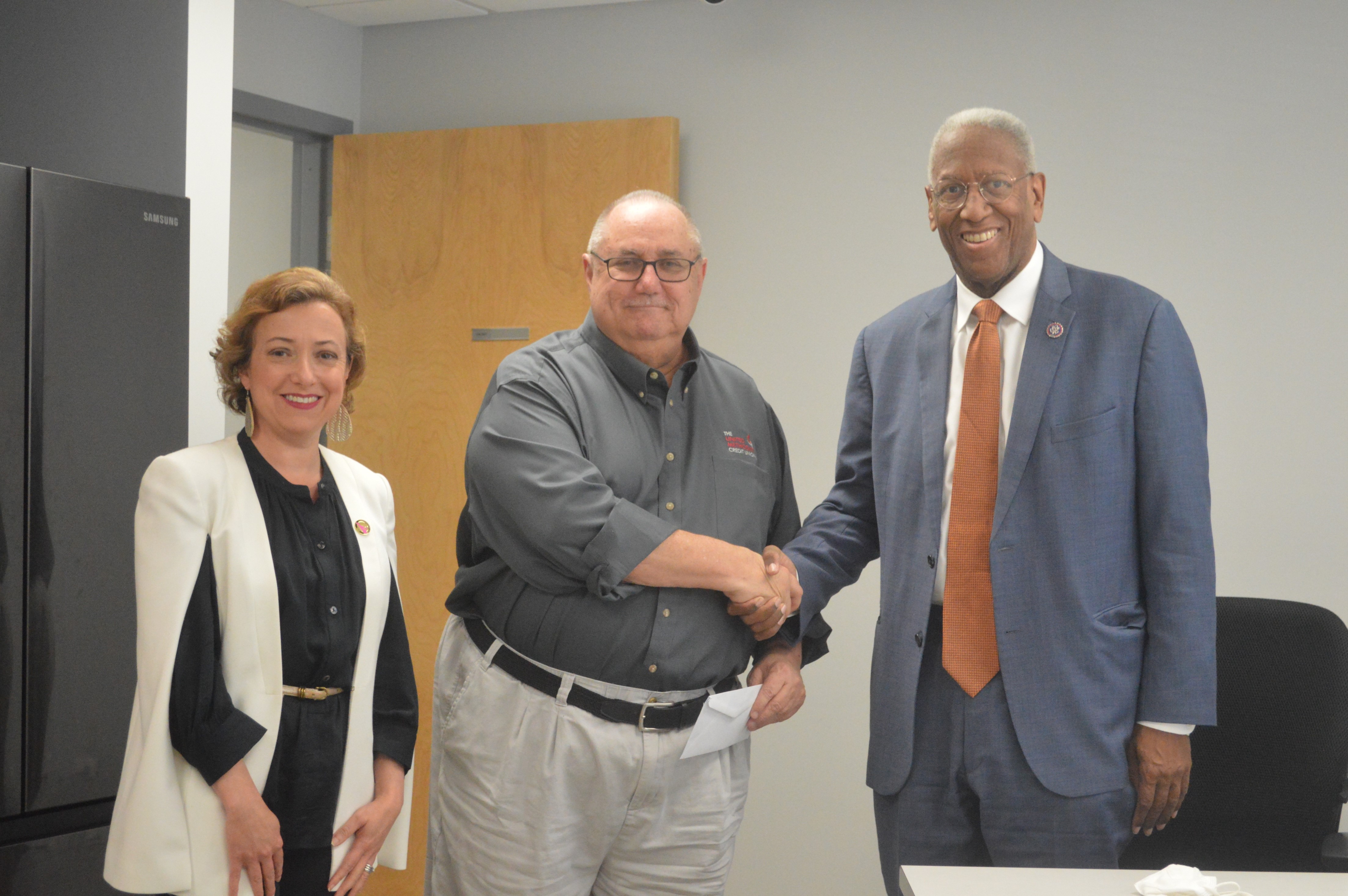 Virginia Credit Union League President/CEO Carrie Hunt, United Methodist Credit Union CEO Jim Eads and Congressman Don McEachin